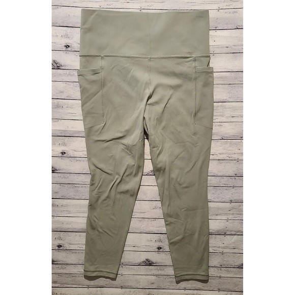 Athleta Pants - ATHLETA Stash Pocket Salutation 7/8 Tight Leggings Women Sz M Workout Yoga Pants